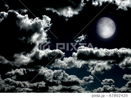 The moon in the night sky 67802420