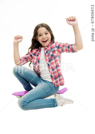 Time to ride. Kid girl excited sits penny board. Time to ride. Kid girl excited sits penny board. 67806653