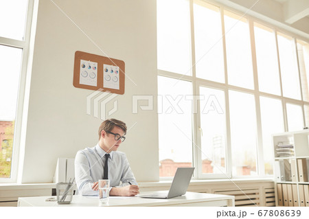Wide Angle View at Businessman in Office 67808639