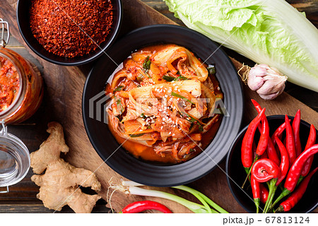 Kimchi cabbage with ingredients on wooden table 67813124