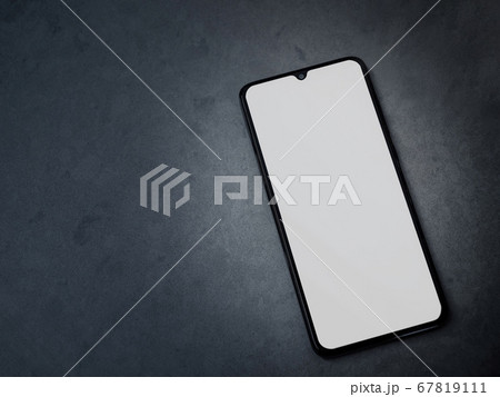Black mobile smartphone mockup lies on the surface 67819111
