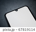 Black mobile smartphone mockup lies on the surface 67819114