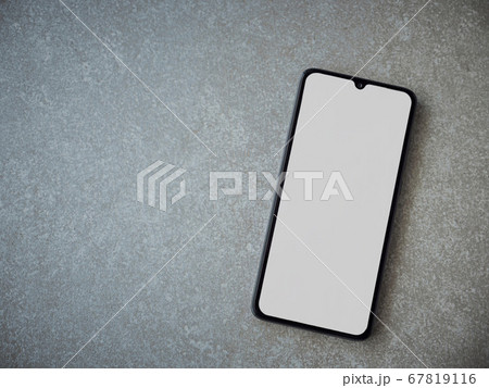 Black mobile smartphone mockup lies on the surface 67819116