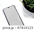 Modern minimalist workspace with black mobile 67819123