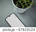 Modern minimalist workspace with black mobile 67819124