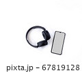 Black wireless headphone and mobile smartphone 67819128