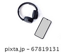 Black wireless headphone and mobile smartphone 67819131