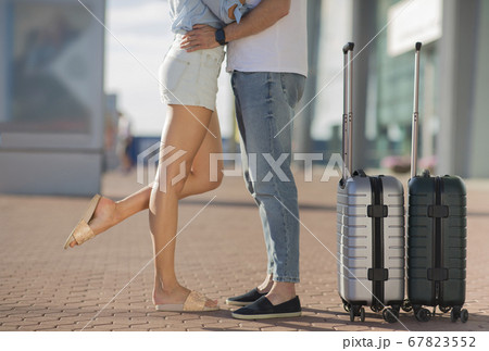 Closeup low section of young couple hugging ouside Closeup low section of young couple hugging ouside 67823552