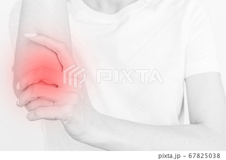 Woman suffering from chronic joint rheumatism. Elbow pain and treatment concept. Woman suffering from chronic joint rheumatism. Elbow pain and treatment concept. 67825038