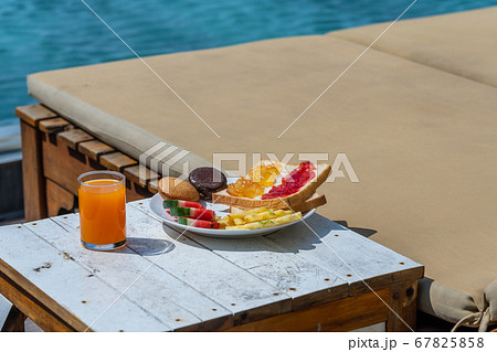 Healthy breakfast with fruit and sandwich at the resort 67825858