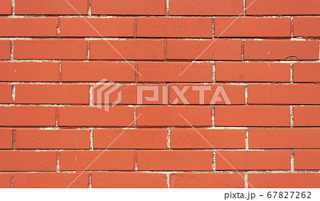 Red brick texture. Brown brick wall with seam Red brick texture. Brown brick wall with seam 67827262