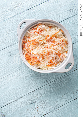 Pan of grated cabbage and carrot with copy space Pan of grated cabbage and carrot with copy space 67837457