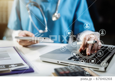Medicine doctor hand working with modern digital tablet computer interface as medical network concept. 67840268