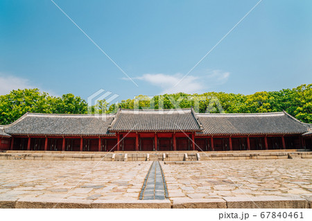Korean traditional architecture with summer green trees at Jongmyo Shrine in Seoul, Korea Korean traditional architecture with summer green trees at Jongmyo Shrine in Seoul, Korea 67840461