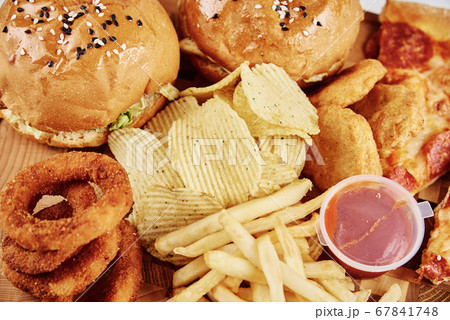 Unhealthy and junk food. Different types of fast 67841748