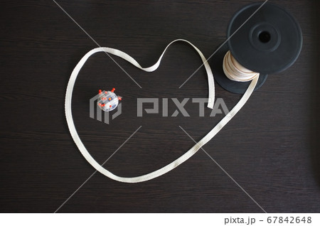 Set of tailoring tools and accessories on a black Set of tailoring tools and accessories on a black 67842648