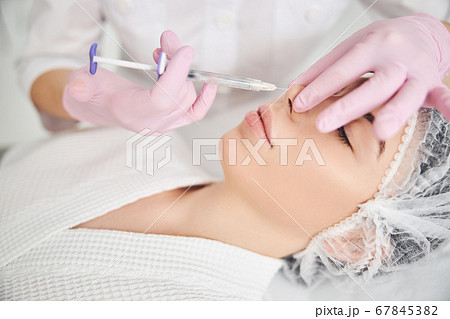 Aesthetic facial treatment provided by cosmetic master Aesthetic facial treatment provided by cosmetic master 67845382