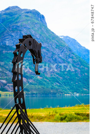 old viking boat in norwegian nature 67848747