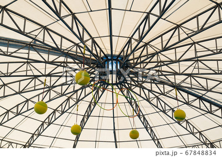 Metal ceiling structure with yellow ball hall 67848834