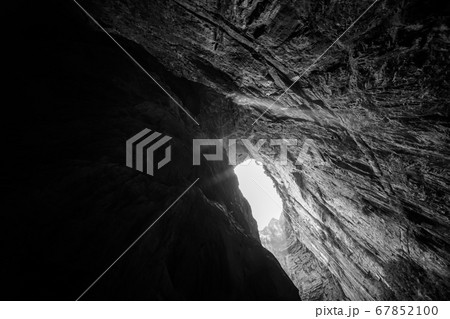 Natural rocky arch fissure in Wulong National Park 67852100