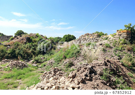 Ruins of stone fortress wall in ancient Troy city, 67852912