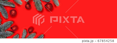 Christmas background with red balls on fir Christmas background with red balls on fir 67854258