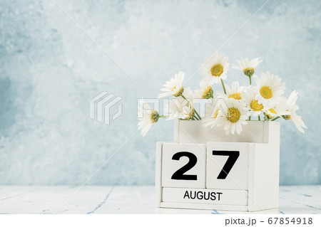 White cube calendar for august decorated with 67854918