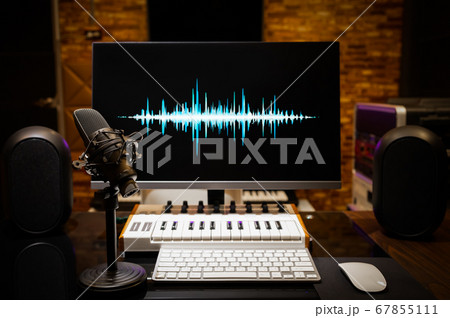 microphone and waveform on display. music production, broadcasting, live streaming concept 67855111