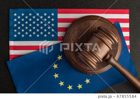 Judge gavel over usa flag and european. Trade war. Judge gavel over usa flag and european. Trade war. 67855584