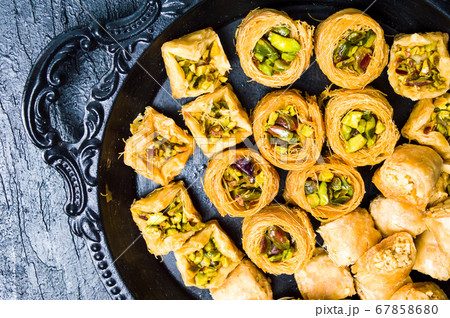 Various Middle Eastern desserts on a plate 67858680