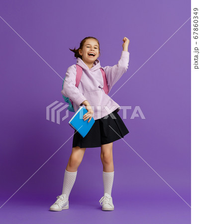 Kid with backpack on color background. Kid with backpack on color background. 67860349