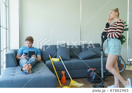 young couple Caucasian people do chore together 67862465