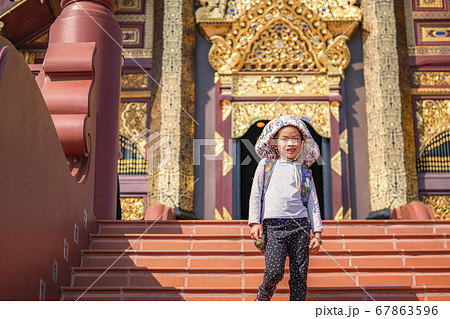 little tourist walking down the stair temple little tourist walking down the stair temple 67863596