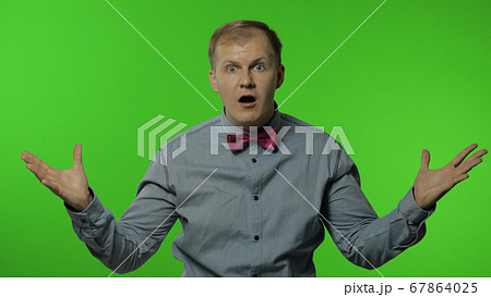 Man is mind blowing by your statement on chroma key background. Showing explosion of ideas Man is mind blowing by your statement on chroma key background. Showing explosion of ideas 67864025