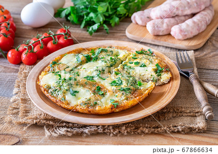Frittata with ground meat and mozzarella 67866634
