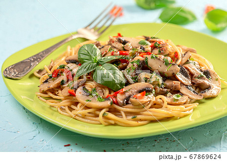 Italian pasta with mushrooms and hot sauce. Italian pasta with mushrooms and hot sauce. 67869624