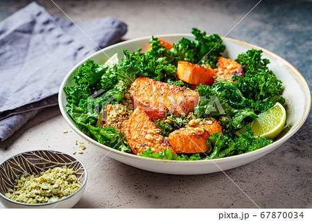 Baked sweet potato salad with kale in white bowl Baked sweet potato salad with kale in white bowl 67870034