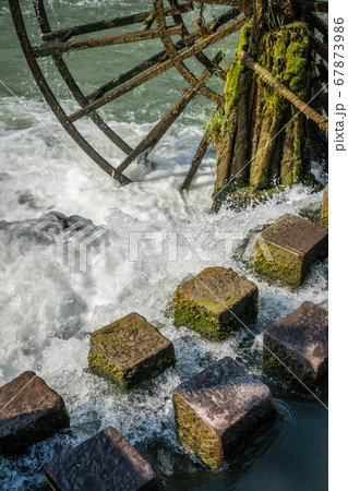 Old wooden mill detail in Fenghuang 67873986