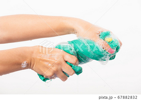 Female squeeze wring out wet fabric cloth with Female squeeze wring out wet fabric cloth with 67882832