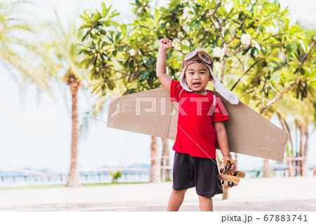 kid little boy smile wear pilot hat and goggles kid little boy smile wear pilot hat and goggles 67883741
