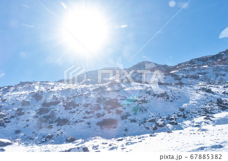 Sun on top of snow cover himalaya range. Frozen Sun on top of snow cover himalaya range. Frozen 67885382
