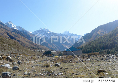 A mountain Alpine hut cabin in high Himalayas A mountain Alpine hut cabin in high Himalayas 67885548