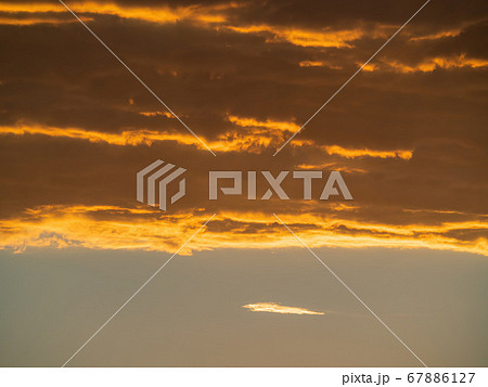 Beautiful sunset afterglow red clouds over the sky 67886127