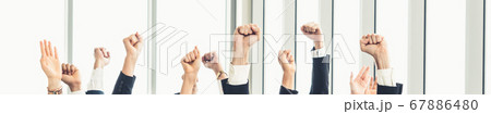 Successful business people standing together Successful business people standing together 67886480
