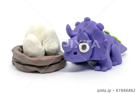 Play dough Triceratopson and egg on white Play dough Triceratopson and egg on white 67886862
