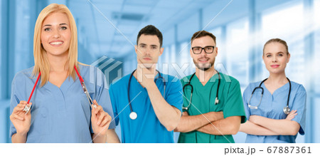 Doctor working in hospital with other doctors. Doctor working in hospital with other doctors. 67887361