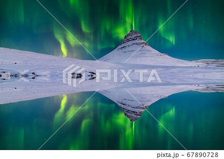 Northern Light, Aurora borealis at Kirkjufell in Iceland. 67890728