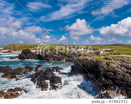 Aerial view of the beautiful coast next to Carrickabraghy Castle - Isle of Doagh, Inishowen, County Donegal - Ireland Aerial view of the beautiful coast next to Carrickabraghy Castle - Isle of Doagh, Inishowen, County Donegal - Ireland 67892352