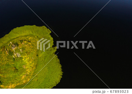 Top view of lake Drivyaty in the Braslav lakes National Park, the most beautiful lakes in Belarus.An island in the lake.Belarus. 67893023