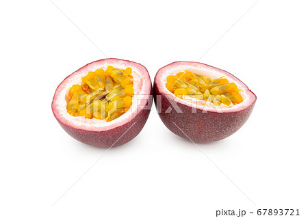 Passion fruit isolated. Two halves of maracuya passionfruit isolated on white background. With clipping paths. 67893721